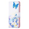iPhone 14 Fodral Motiv Fjärilar och Blommor